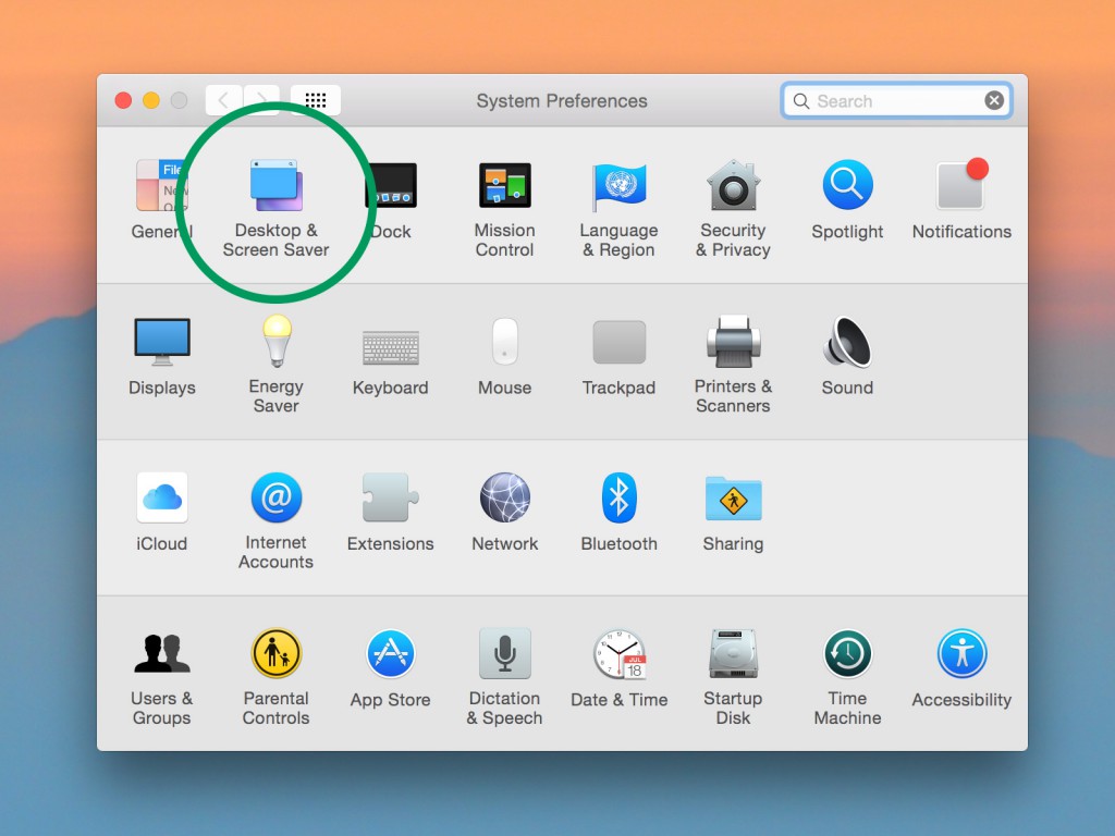 System Preferences with Desktop and Screensaver circled